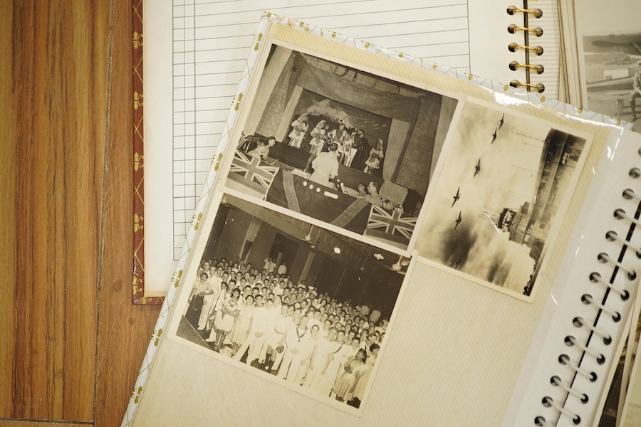 Two photograph albums containing an archive of WWII photos mainly of the RAF in Japan and the Far East, including a number of photos of RAF aircraft, aircraft carriers, Royal Naval ships, photographs of crew, military so